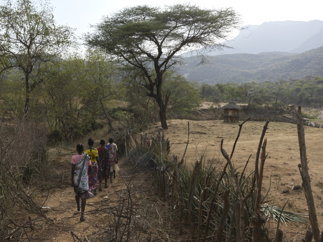 Women making a long journey for water during a drought in Kenya.
