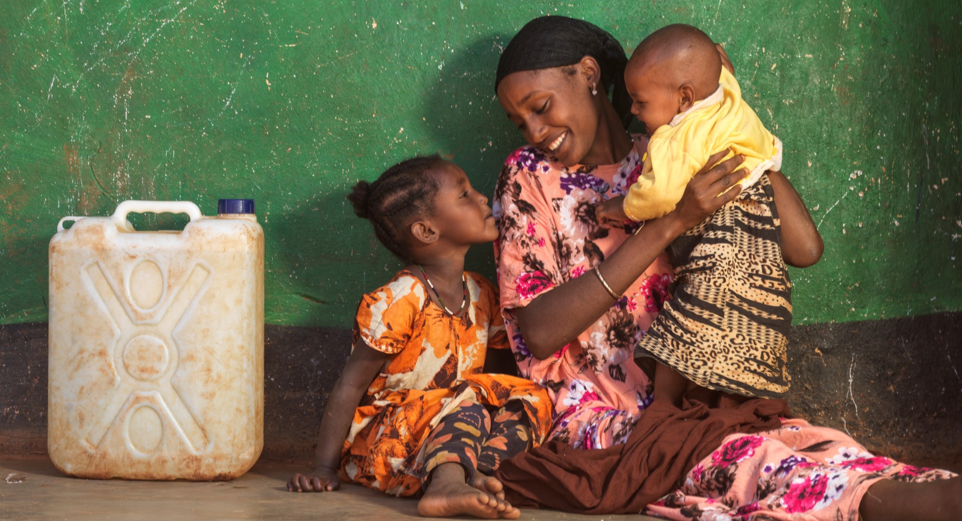 Darmi, 23, with daughters Lelo, 4, and Nadi, 1, at home in Moyale  .