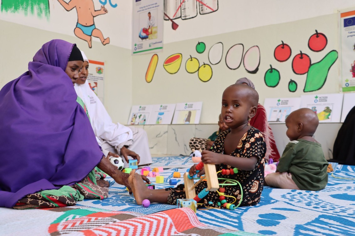 Caregivers and children connect at the stabilization center