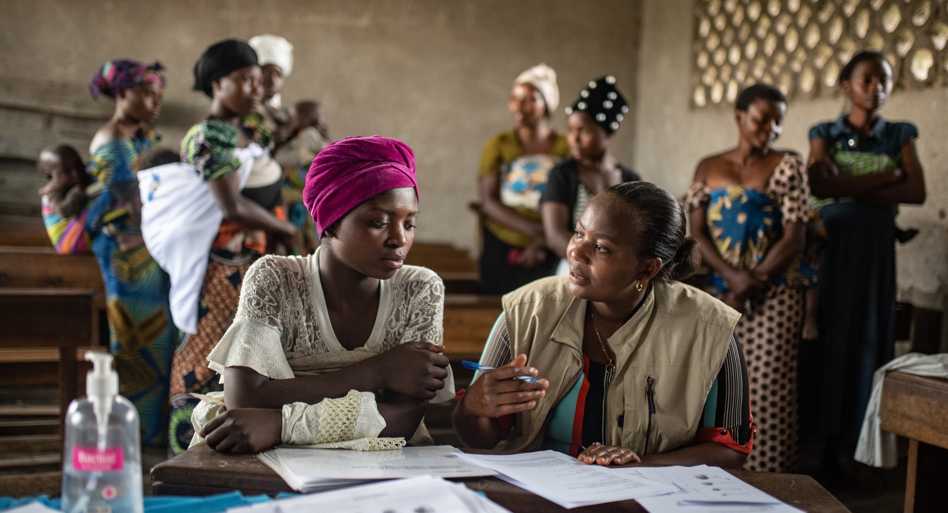 A psycho-social worker meets with women in Kichanga, DRC.