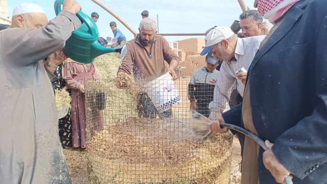 Farmers learning to make compost.