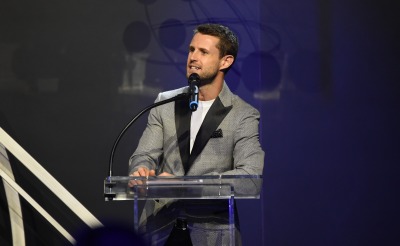 A man on a podium at a gala