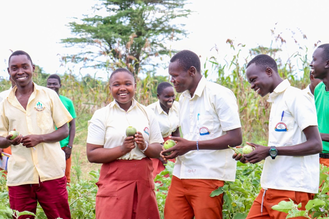 Patience and her fellow club members grow produce in the school garden.