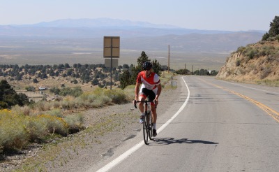 A person cycling to raise money for Action Against Hunger